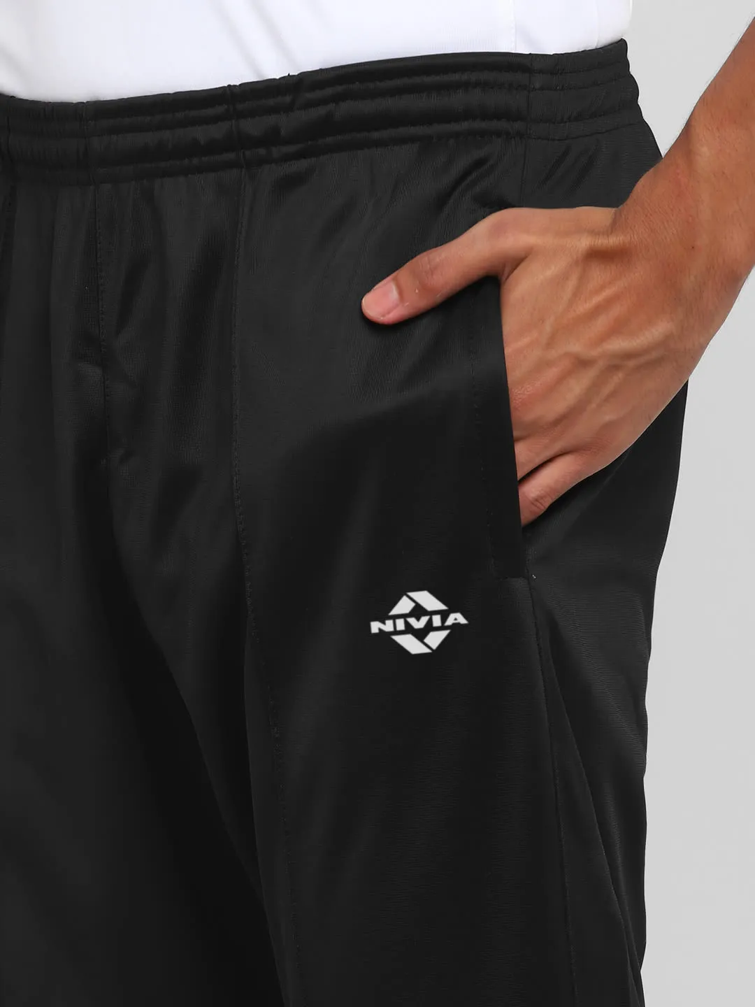 Nivia SuperPoly Lower for Men/Knitted heavy Polyester lower with Zipper Pocketfor Men - Black
