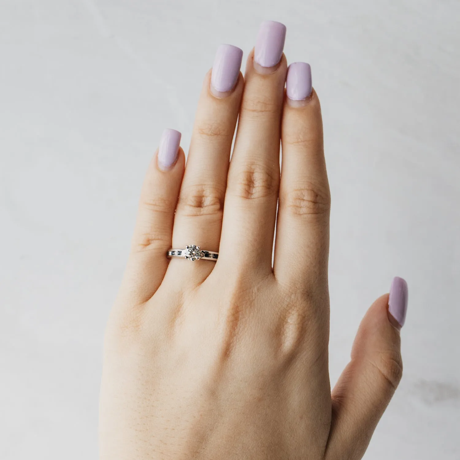 Triple X Round Brilliant Diamond Accented Solitaire Ring