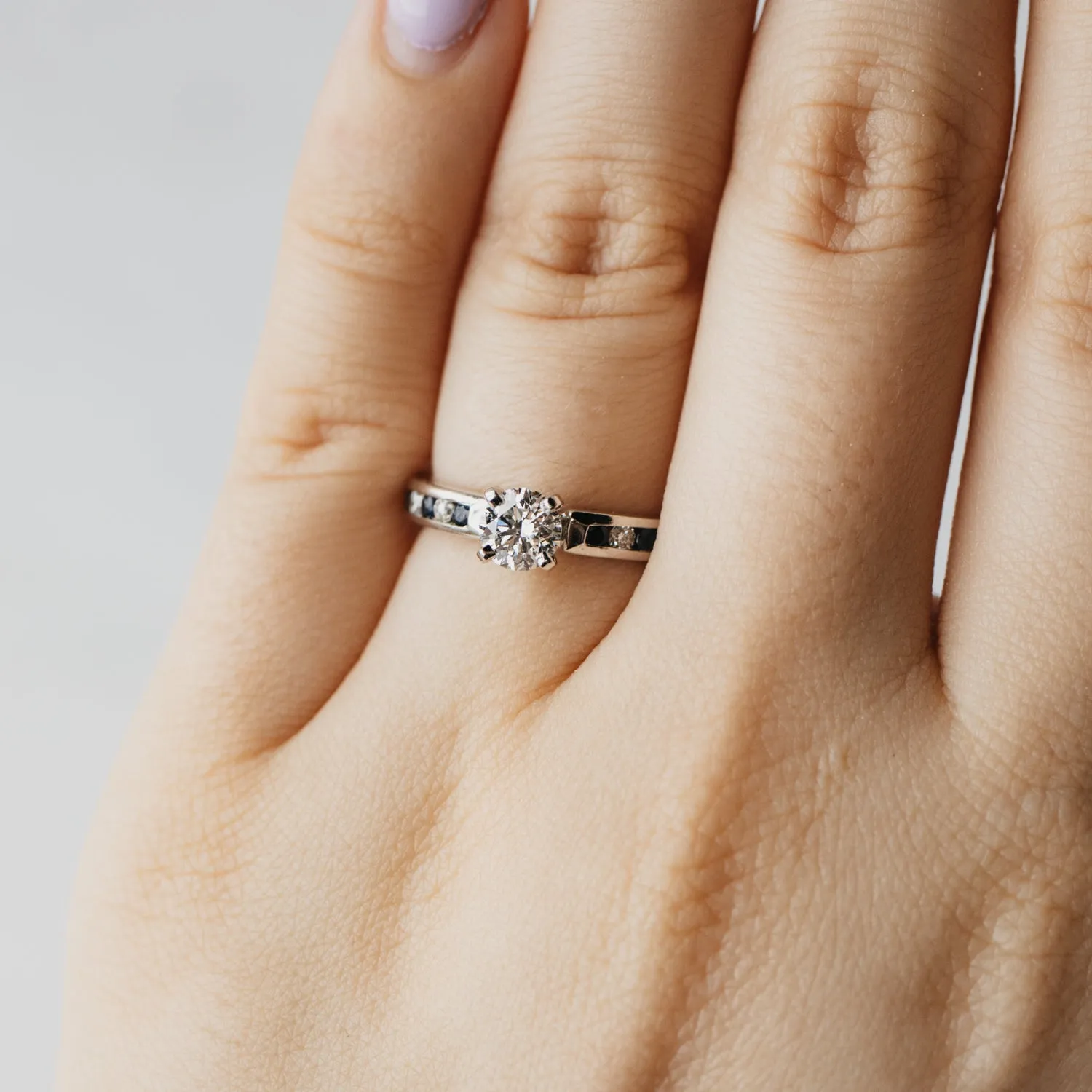 Triple X Round Brilliant Diamond Accented Solitaire Ring